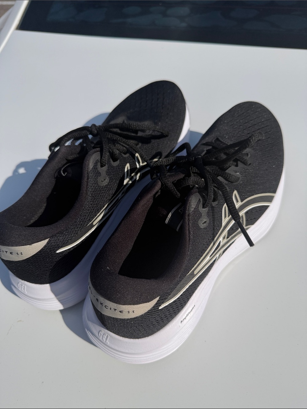 Asics Black and White Women's Running Sneakers